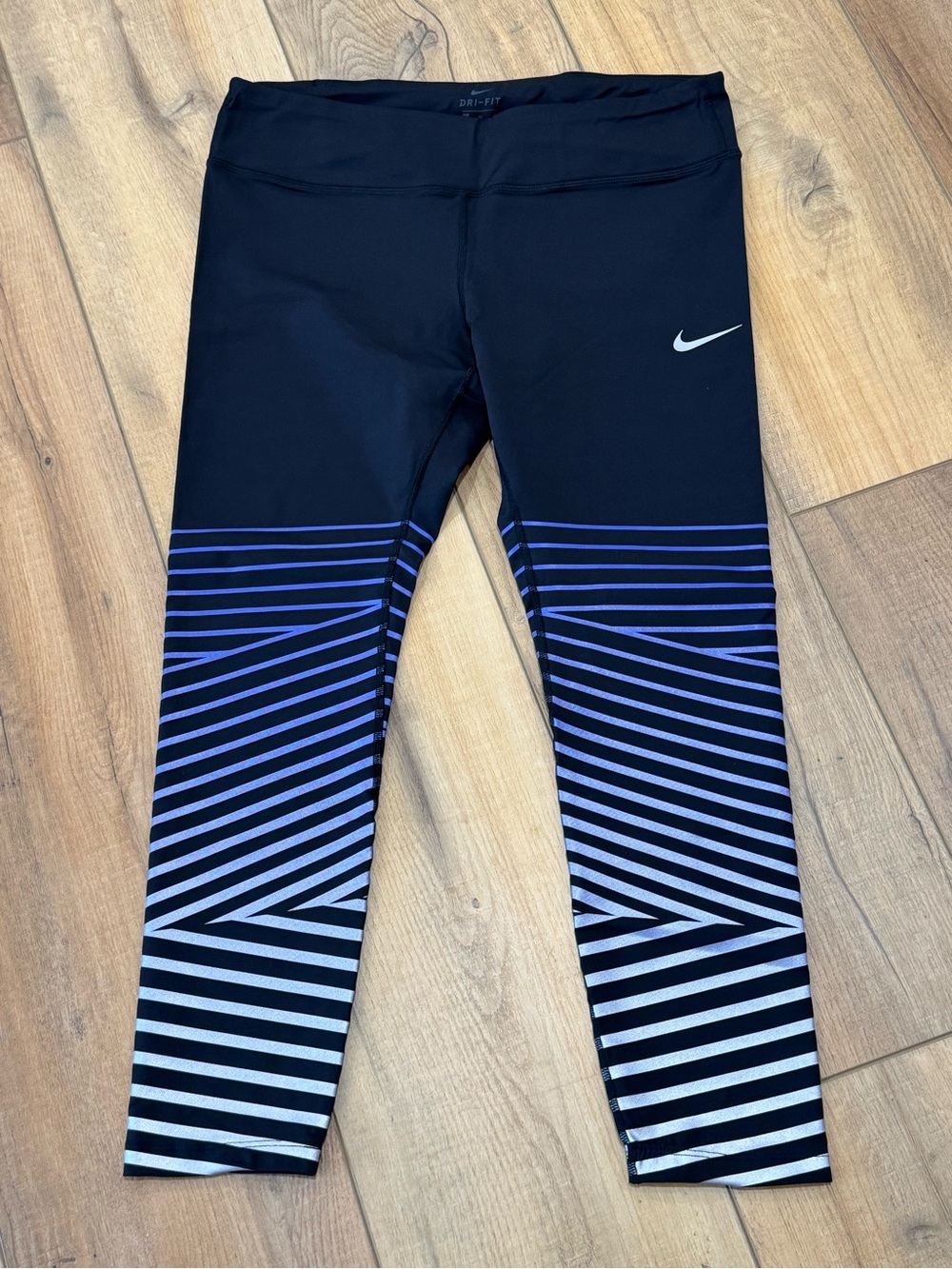 Nike Dri Fit Epic Luxe Black Leggings with Purple Gradient Stripe Detail